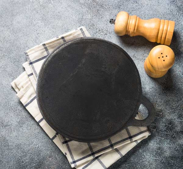 https://www.tredyfoods.com/cdn/shop/products/CastIronDosaTawa-11Inches-LightTREDY3623_800x.jpg?v=1639388897